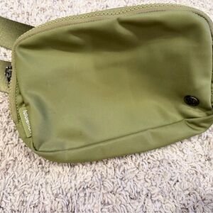 Olive green Lululemon belt bag